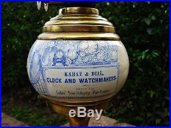 Rare vintage porcelain ceramic shop advertising oil lamp jewellers clocks