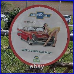 Vintage 1957 Chevrolet''Sweet, Smooth And Sassy'' Porcelain Gas & Oil Sign
