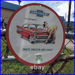 Vintage 1957 Chevrolet''Sweet, Smooth And Sassy'' Porcelain Gas & Oil Sign