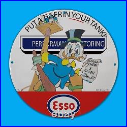 Vintage Esso USA 62 Red Reg. U. S. Pat. Off. Service Man Cave Oil Porcelain Sign