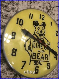 Vintage Line Up With Bear Electric Clock Gas Oil