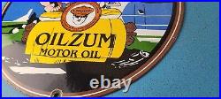 Vintage Oilzum Gasoline Sign Flintstones Cave Man Porcelain Gas Oil Pump Sign