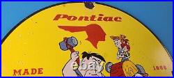 Vintage Pontiac Automobiles Sign Flintstones Cave Man Porcelain Gas Pump Sign