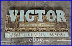 Vintage Victor Gaskets Oil Seals Packings Metal On Board Sign 25.5 X 12